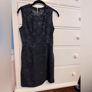 Black brocade sleeveless dress